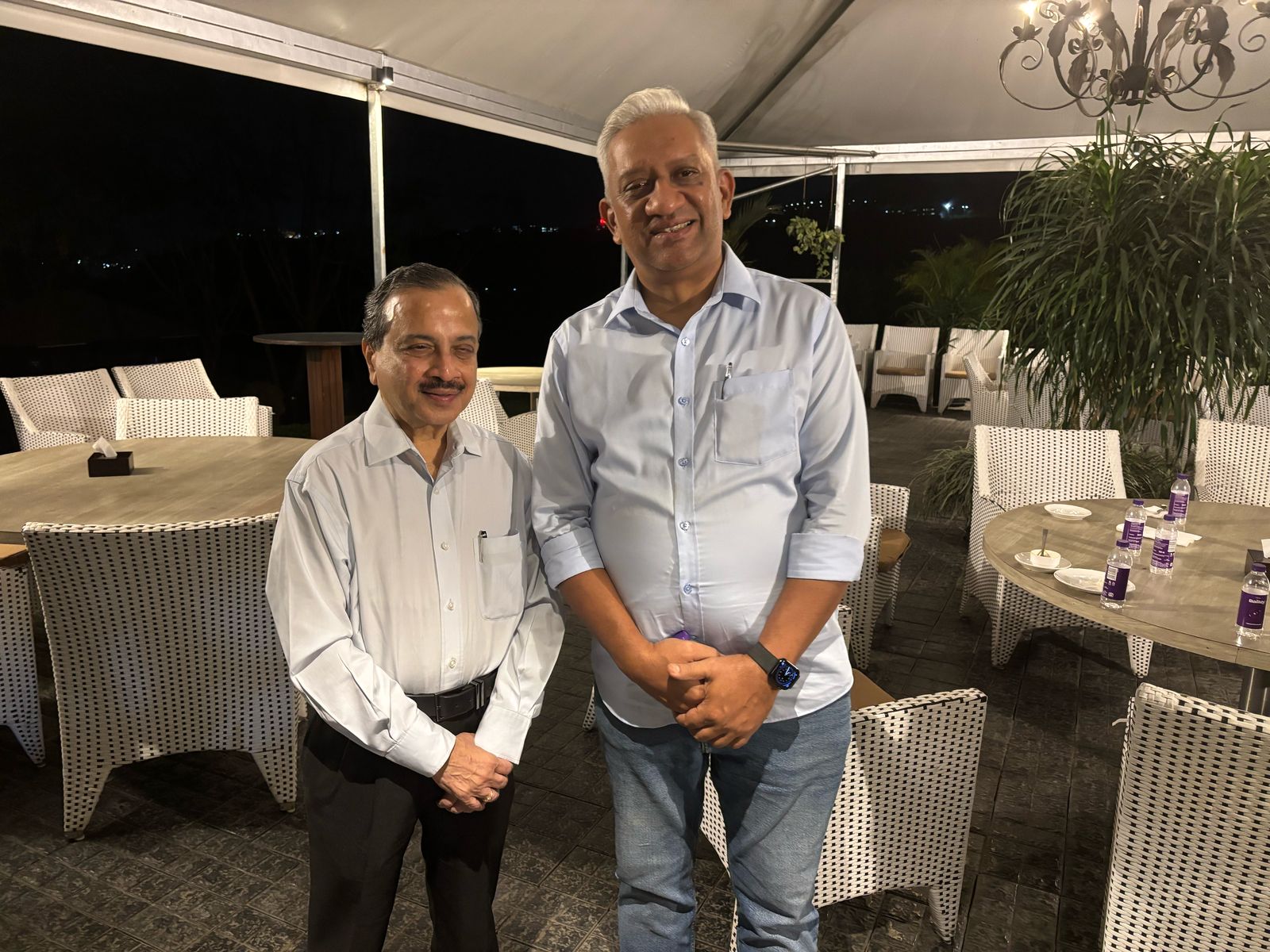 Satish Ramanan at a professional gathering with a fellow business leader