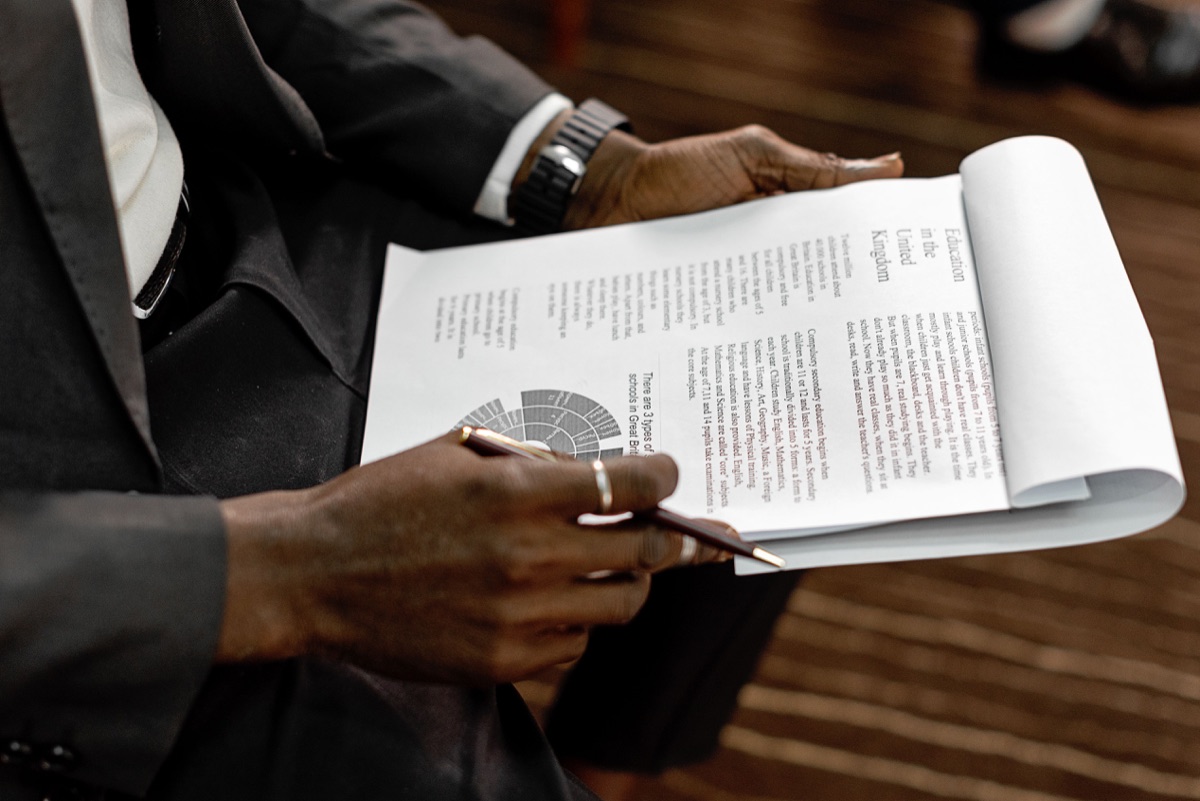 Business leader reviewing a financial report